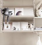 String magazinehouder